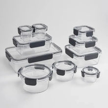 Assorted clear Tritan food containers with black latches and hinged lids, set of pieces