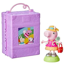 Purple dress-up wardrobe playset case with small Peppa Pig doll and accessory