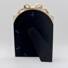 Gold resin tabletop picture frame back with bow topper and easel stand
