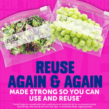 Two food storage slider bags with grapes and salad inside for reuse