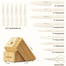 Kitchen knife set with multiple knives, kitchen shears, and a wooden storage block