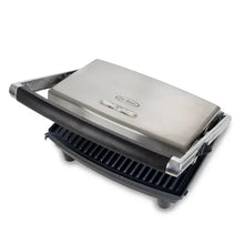 Indoor panini press with closed lid, silver top and black ridged grilling surface
