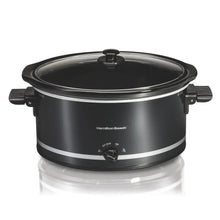 Black slow cooker with domed lid and side handles; smooth stainless ring trim