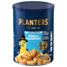 Blue steel canister of whole cashews with cartoon mascot and cashews at bottom