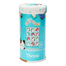Rolled teal fleece throw blanket with animal face pattern, in packaging
