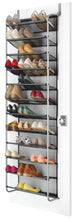 Over-the-door shoe rack filled with shoes on gray mesh shelves and metal frame.