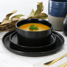Black stoneware bowl and plate set, glossy finish