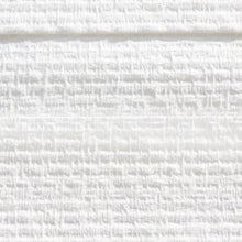 Close-up of white 1-ply paper towel texture, embossed pattern
