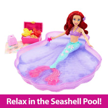 Mermaid doll in purple seashell pool with moldable sand accessories