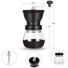 Manual coffee bean grinder with glass canister shown with size measurements