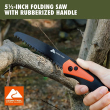 Folding saw with rubberized orange-and-black handle for camping