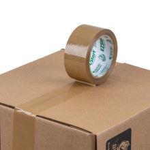 Tan packaging tape roll resting on a cardboard box with strip ready to seal