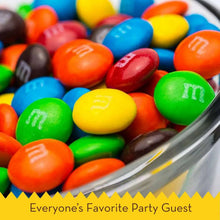 Candy-coated chocolates in assorted colors with dark pieces mixed in