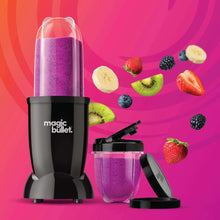 Black Magic Bullet blender base with purple smoothie in clear to-go cup