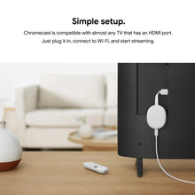 White media streamer connected by HDMI cable to a TV, remote on table