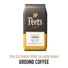 Peet's Luminosa ground coffee bag; dark gray with yellow base, 10.5 oz net weight