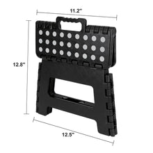 Foldable plastic step stool, black with dot-pattern top and handle, shown with size dimensions