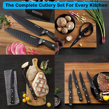 Complete cutlery set with multiple black knives arranged on a serving tray and cutting board.