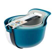 Nested plastic mixing bowl set with packaging insert, blue bowls and light bowls