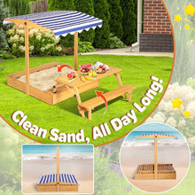 Wooden sandbox with striped canopy and picnic table, with bench seating on side