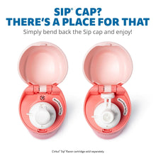 Coral pink flip-top water bottle with Sip cap open, showing straw port