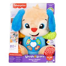 Boxed plush puppy musical learning toy with blue ears and light-up buttons