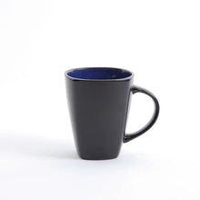Dark stoneware mug with blue interior, square dinnerware set