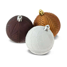 Round Christmas ornament set: dark brown, white, and bronze textured balls with gold caps