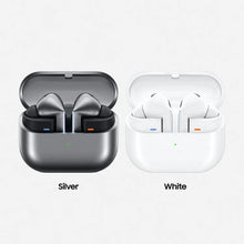 Silver and white charging cases with earbuds shown, earbud tips facing camera