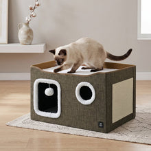 Member’s Mark brown cat condo with a cat on top and a textured side scratching panel
