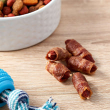 Dog treat pieces, rolled jerky bites with ridged spirals