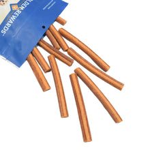 GoldenRewards dog treat sticks spilling from open pouch