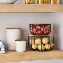 Set of 2 round black wire baskets with bamboo lids, for fruits or pantry.