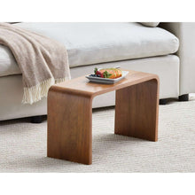 Amelia C-shape side table beside a sofa with tray on top, dark wood finish