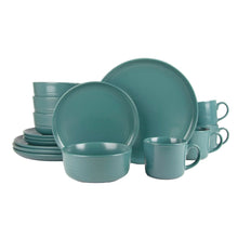 Emerald green stoneware dinnerware set with plates, bowls, and mugs