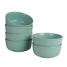 Seafoam green ceramic cereal bowls, four stacked bowls and two smaller bowls
