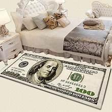 Money print area rug with overlapping $100 bills, light cream background