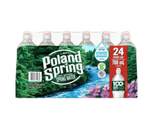 Poland Spring spring water multipack, front row of bottles with green labels