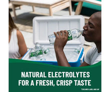 Poland Spring spring water bottle in cooler, natural electrolytes promo text
