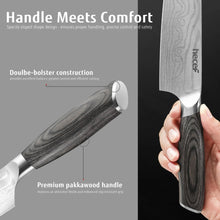 Chef knife with dark wood double-bolster handle, angled side view