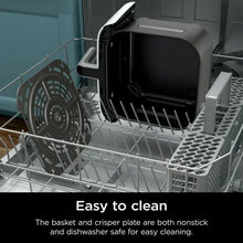 Ninja air fryer crisper plate in a dishwasher rack with perforated surface