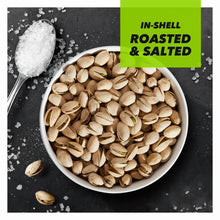 In-shell roasted & salted pistachios in a bowl with salt crystals