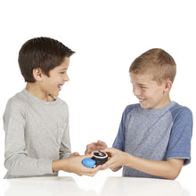 Bop It! micro series electronic game toy between two kids’ hands