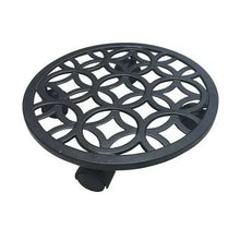Black round plant caddy with circular lattice design and raised caster feet