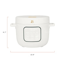 White electric rice cooker with digital display and compact rounded body