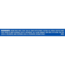 Dog biscuit ingredients panel listing whole wheat, sugar, peanut butter, and palm oil