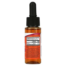 Vitamin E liquid supplement bottle with black dropper and supplement facts panel