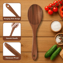 Wooden cooking spoon with hanging hole, smooth handle, rounded bowl.