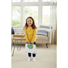 Child holding a white LeapFrog learning toy console
