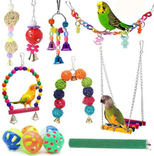 Assorted hanging bird swing toys with beads, bells, and colorful ball toys